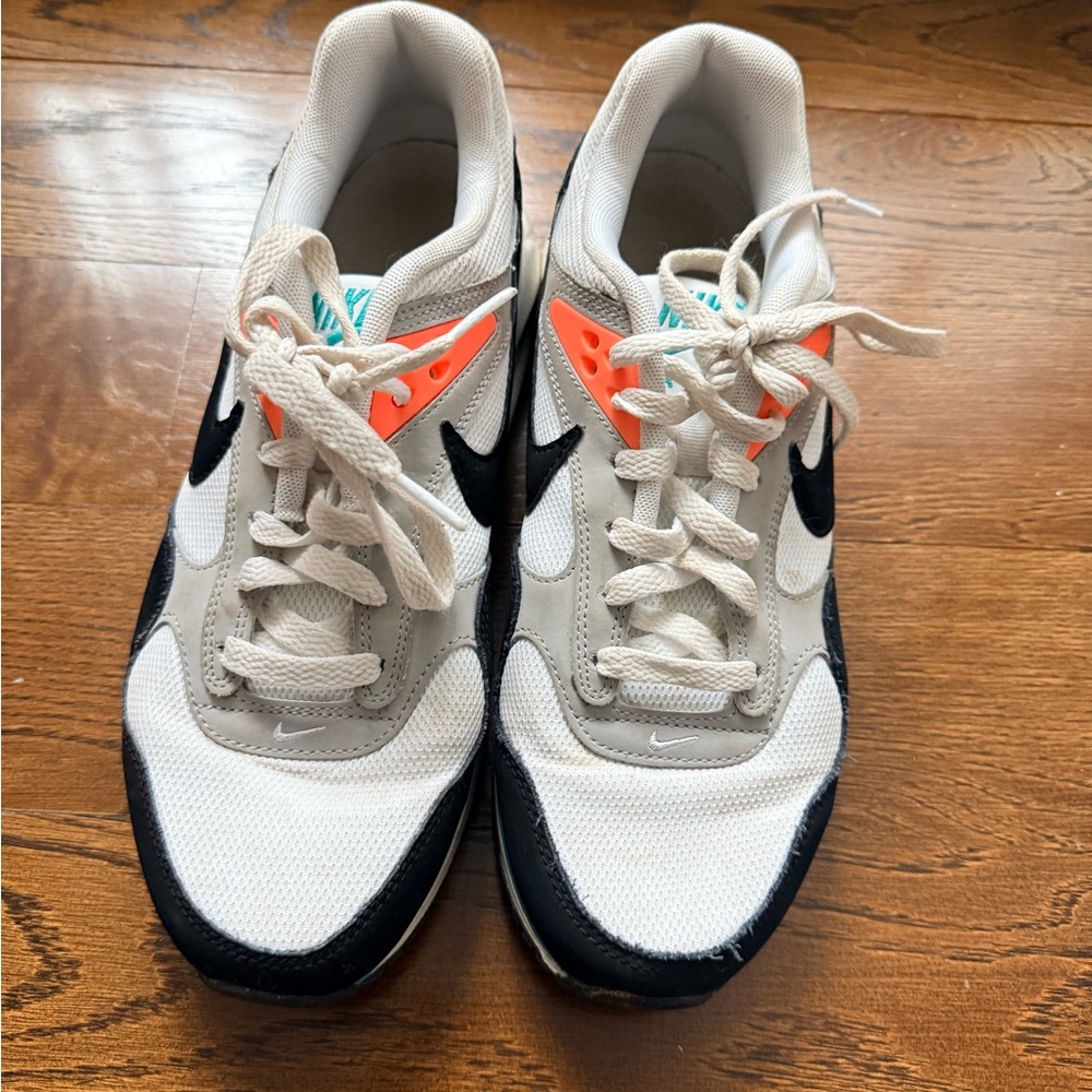 Nike White and Black Sneakers with Orange Accents